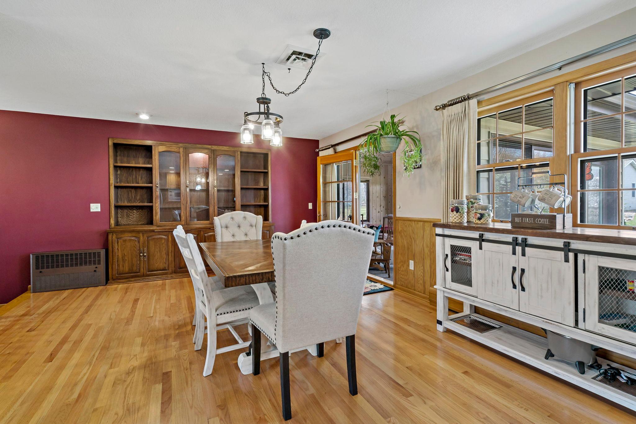Dining area with built in hutch & opens up to the 3 season porch