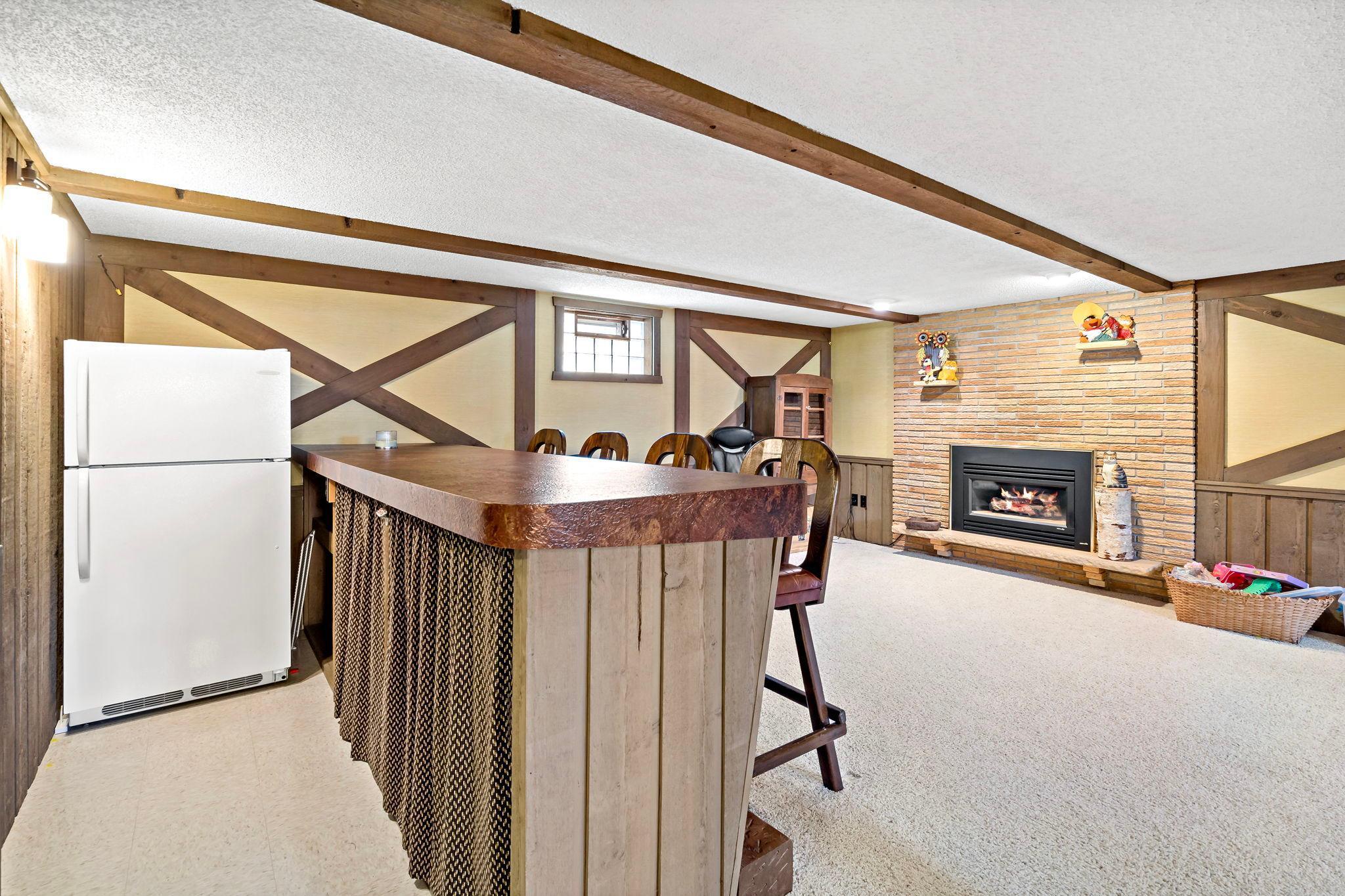 Lower level with a gas burning fireplace.