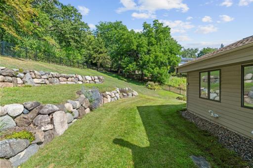Set on 0.43 acres, the fully fenced backyard offers an impressive amount of private outdoor space to enjoy.