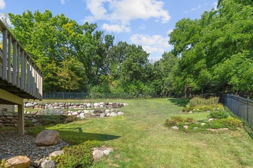 The yard also offers usable flat green spaceâperfect for play, pets, games, or simply enjoying the outdoors.