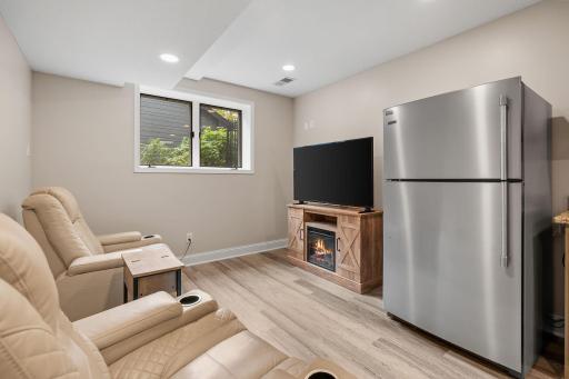 Space for comfortable seating lets conversation and a friendly game of pool share the same room.