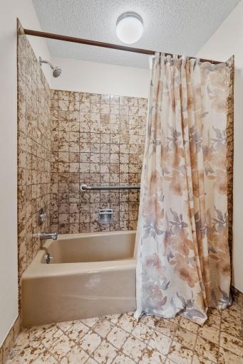 A tub and shower combination offers the flexibility of a relaxing bath or a quick rinse.