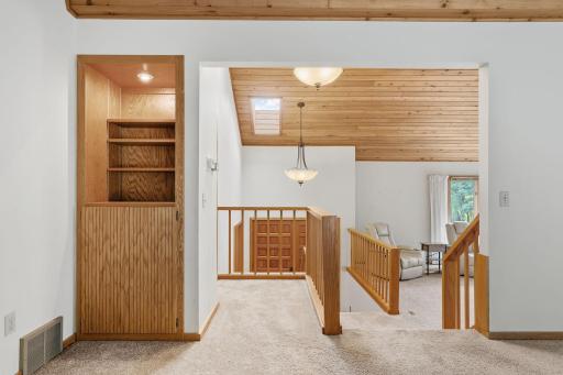 Built-ins add a custom touch to the family room, with room to display favorite pieces and keep everyday essentials tucked away.