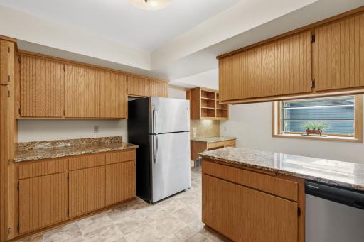 Stainless steel appliances include a refrigerator updated in 2022.