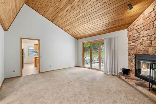 1. Views of the wooded backyard bring the homeâs private setting into everyday living.
