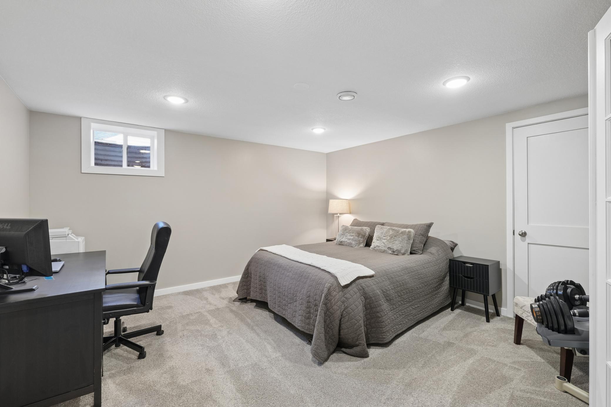 This lower level office is currently being used as a bedroom, but can easily be converted to a 4th bedroom with an egress window