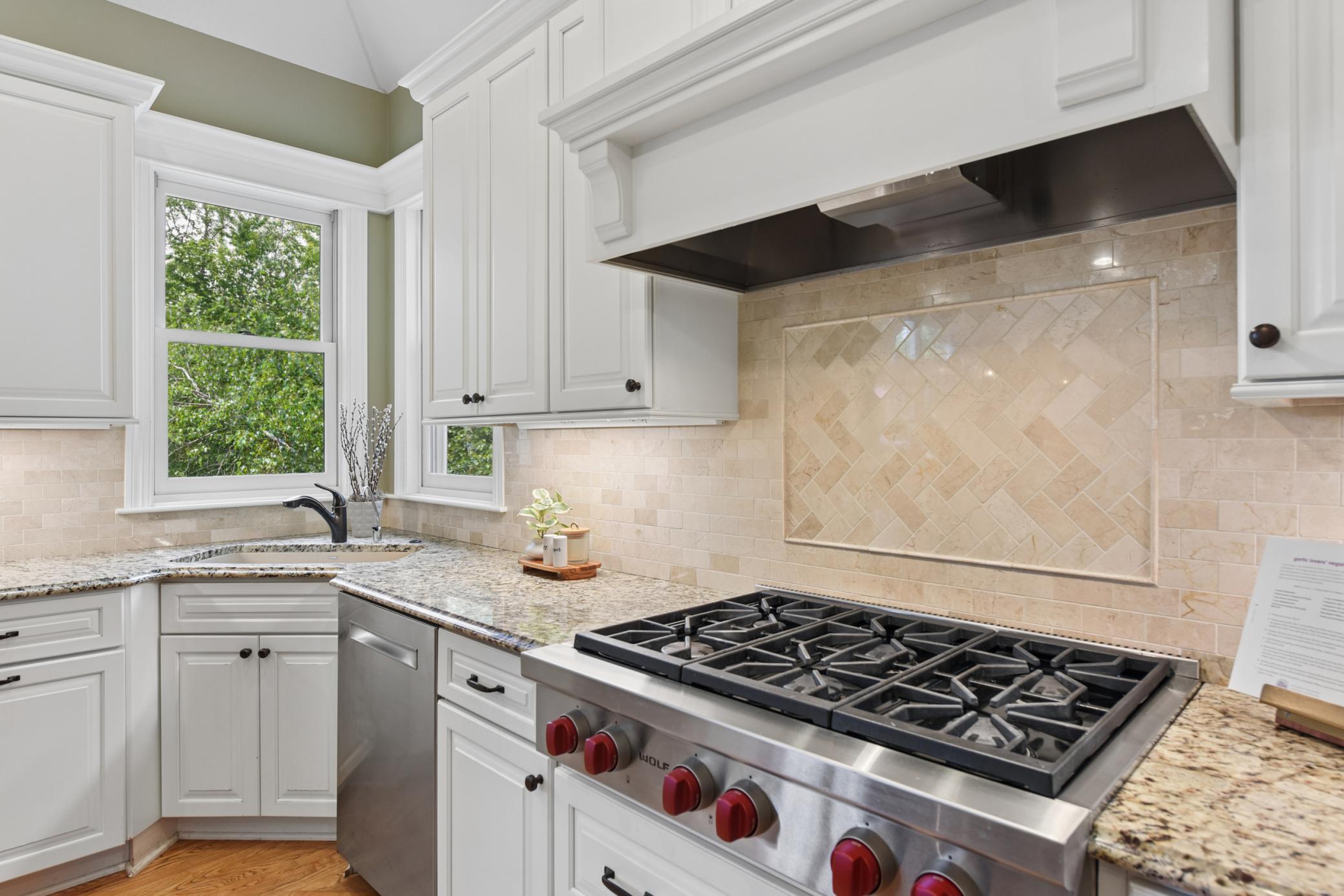 Beautiful Travertine tile work and vent hood
