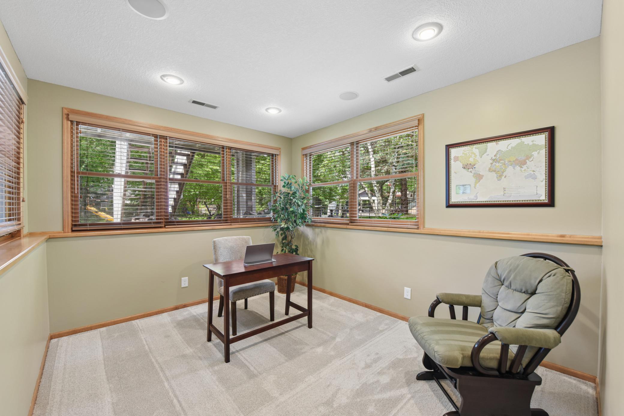 Lower level second sunroom can be an office