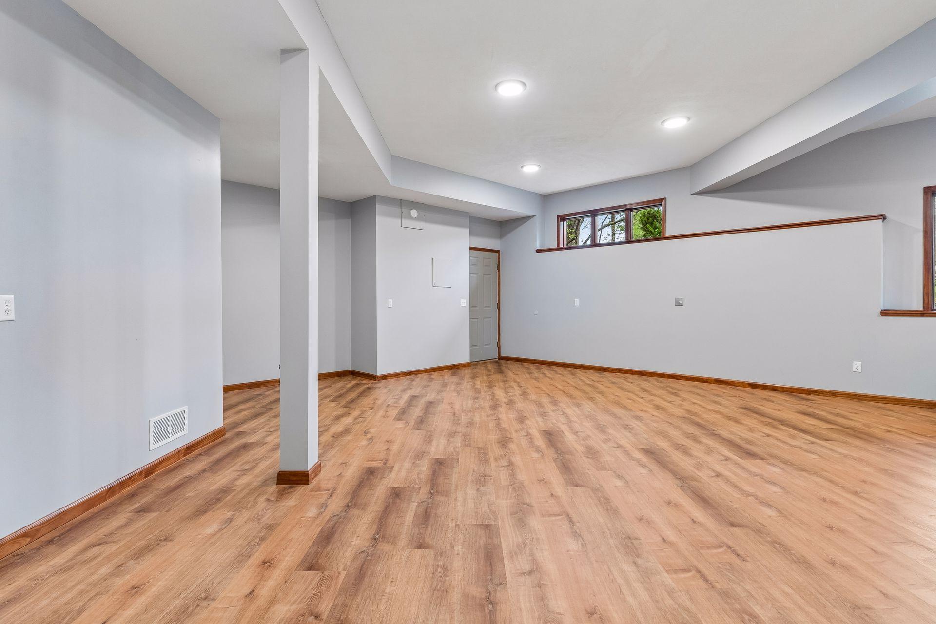 Lower level bonus room/workshop space used for years to operate an in-home business. This room is sound proofed. It is also heated and cooled separately and has a separate entrance.