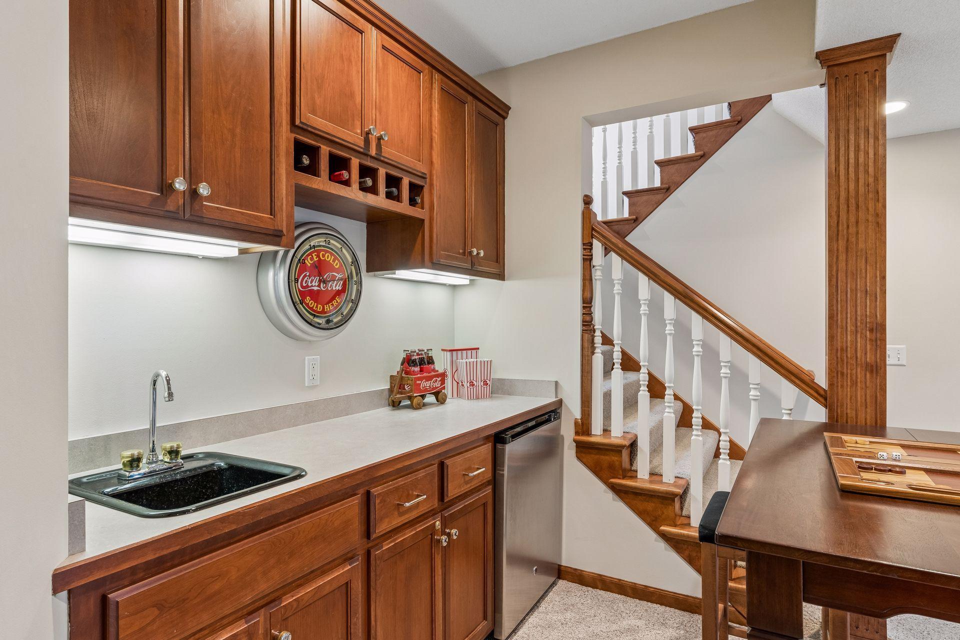 Add a microwave and coffee maker to make this a mini kitchen for guests staying in the lower level bedroom.