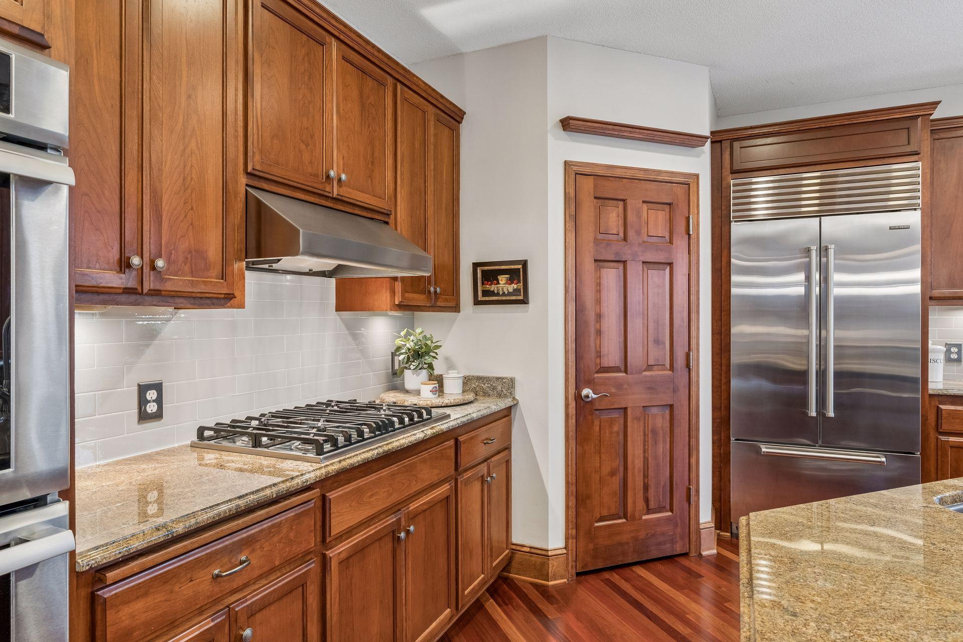 Subzero, Viking and Thermador appliances, plus double ovens, make cooking in this kitchen exciting.