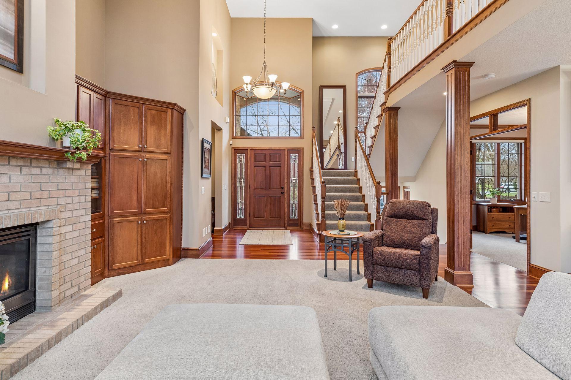 Elegant open staircase, that decorates beautifully for the holidays and leads to this homes upper level.