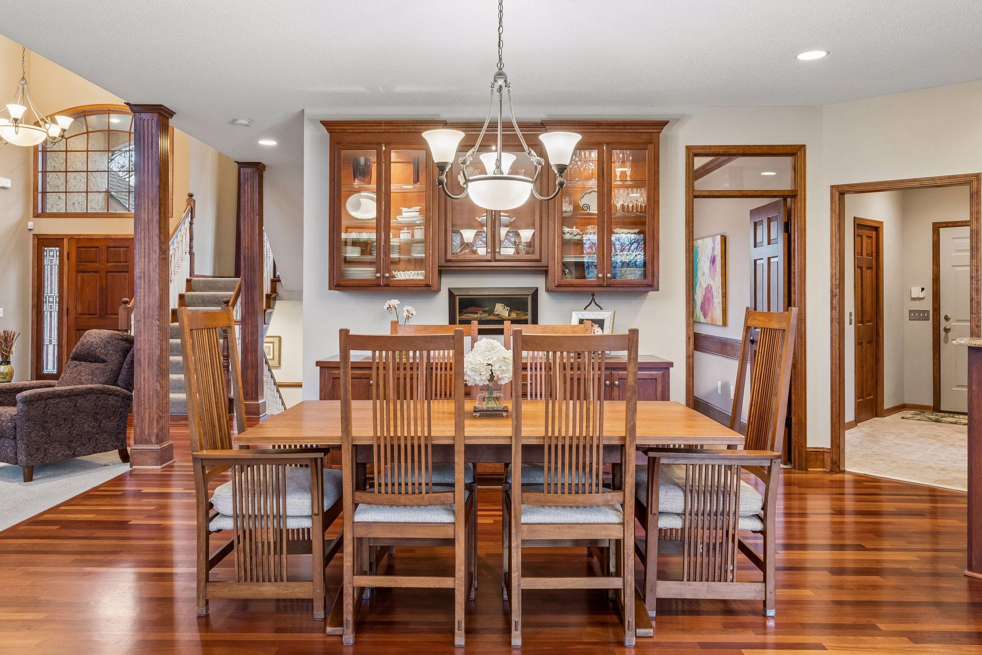 Semi-formal dining area with room to expand the table for larger gatherings and gorgeous built-in for added storage.
