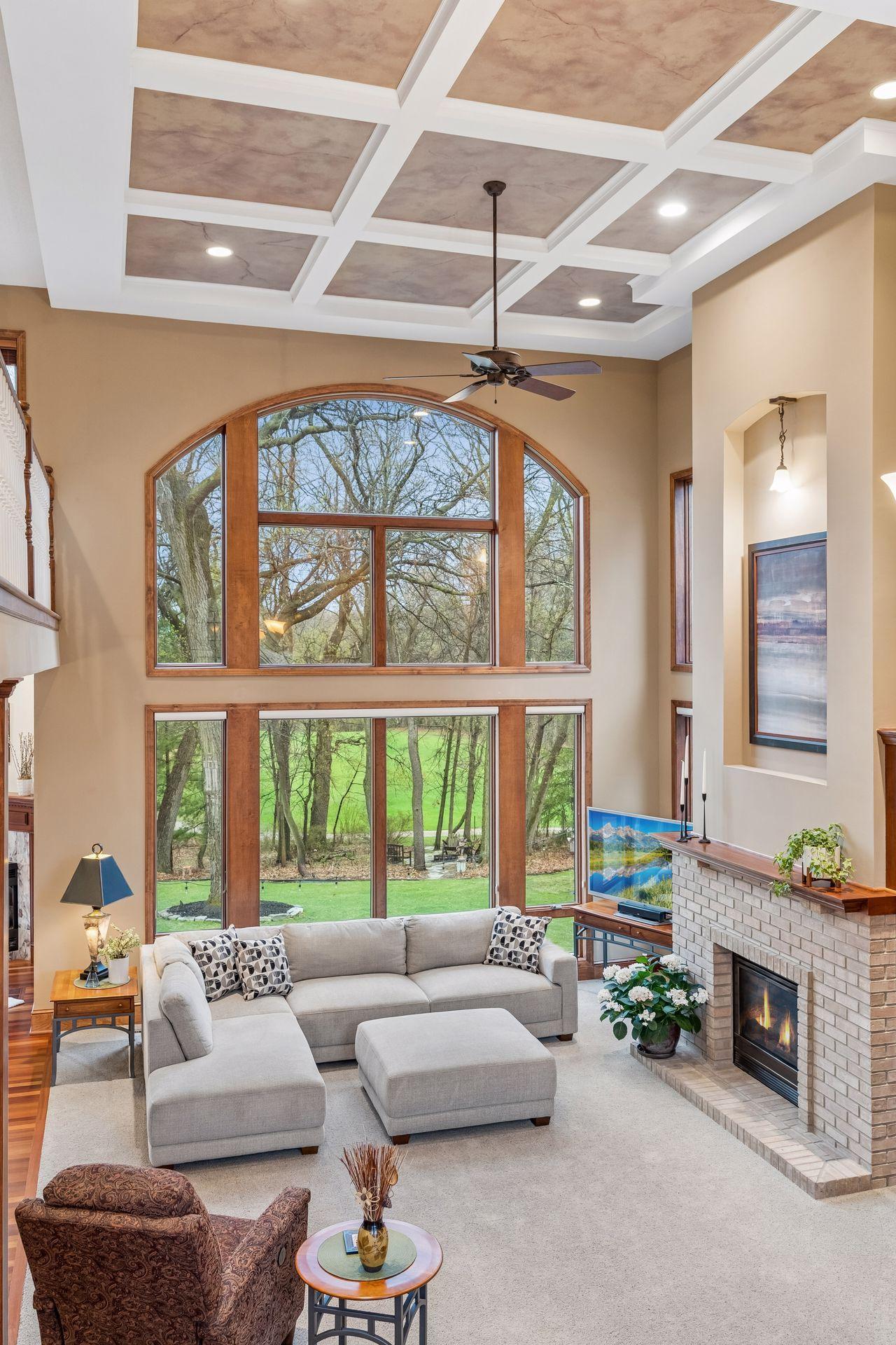 Impressive view from the upper level loft, overlooking the majestic main level great room.