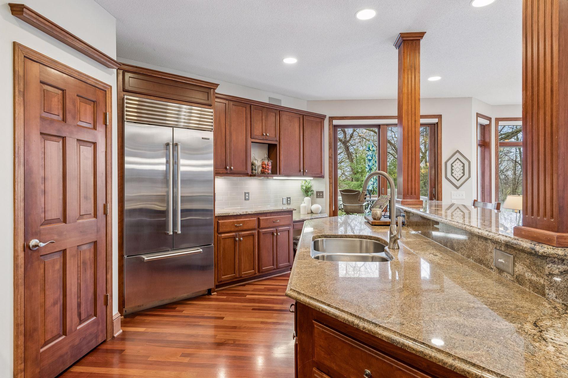 You will love the views from this outstanding kitchen as well as the upgraded appliances and walk-in pantry.