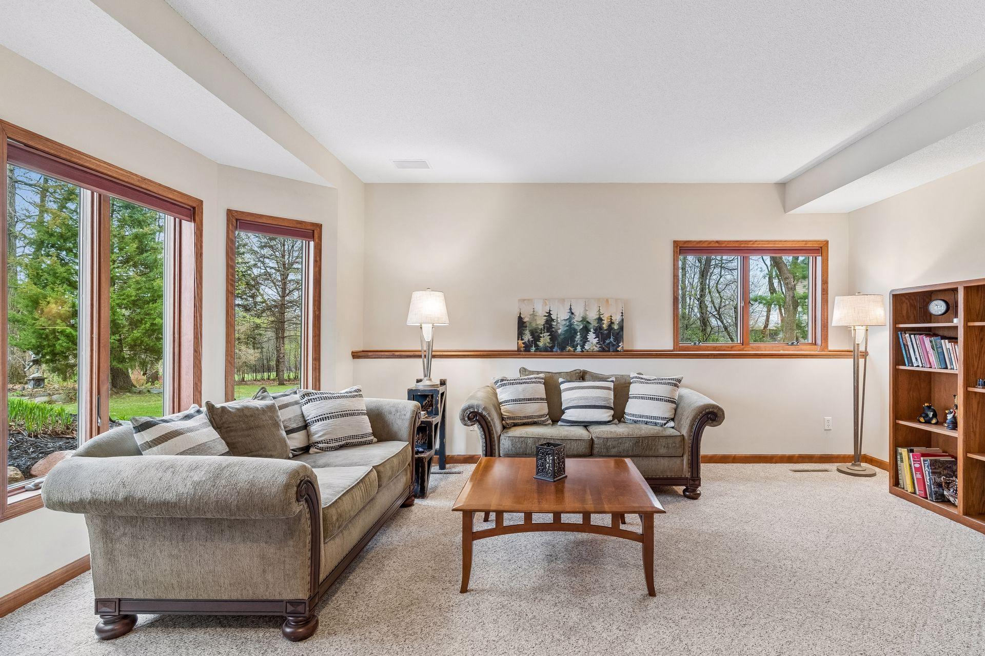 The lower level family room welcomes a bright space for entertaining.