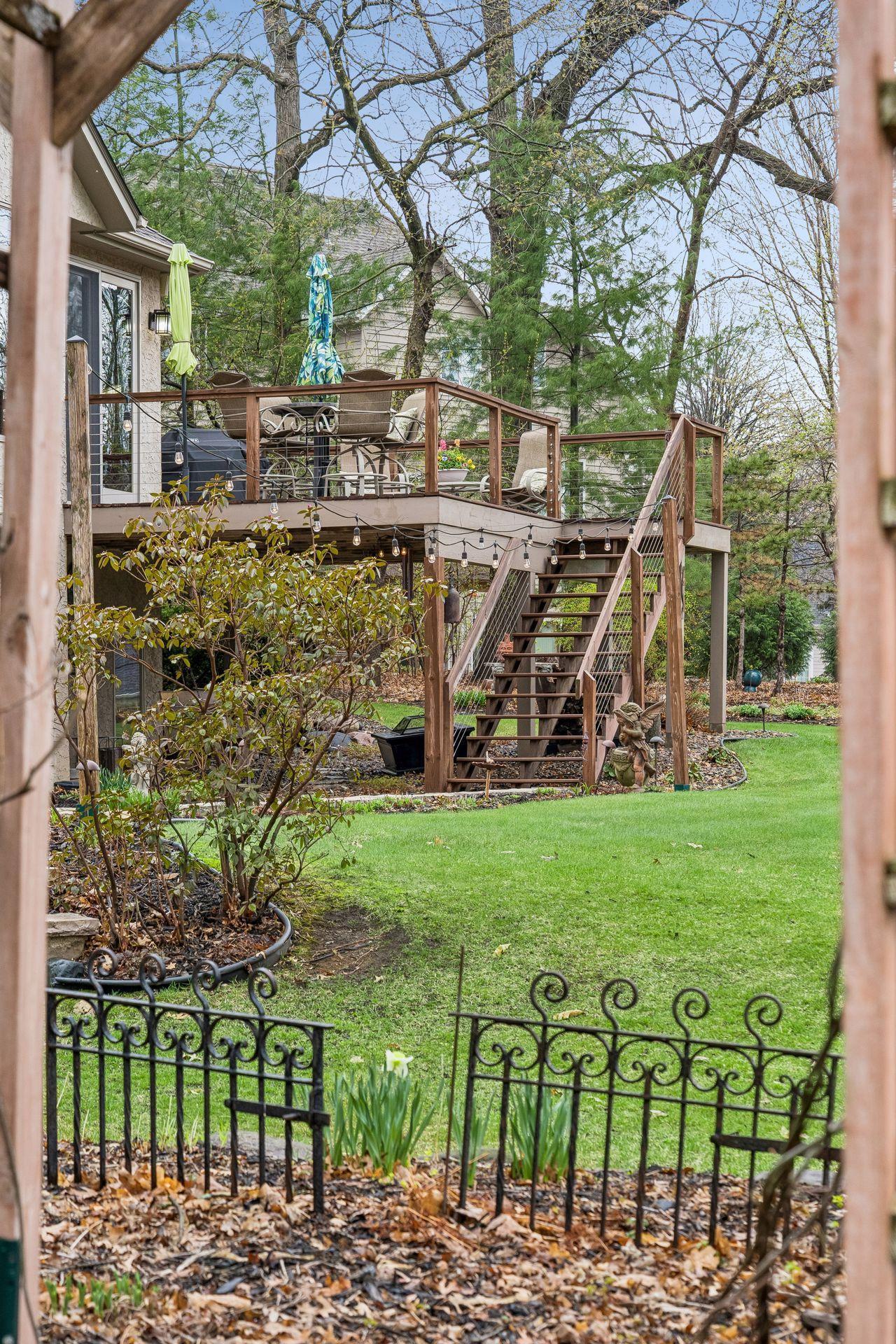 Watch for surprises to bloom in the landscape and the trees to fill out, making this lot even more magical.