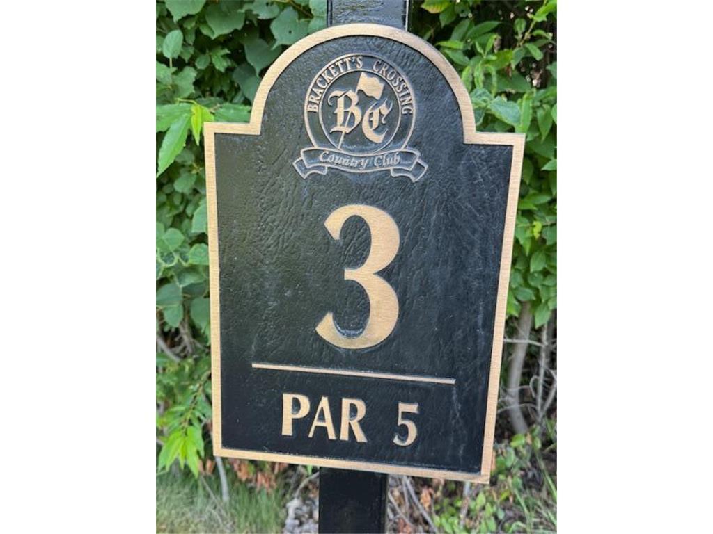 Home overlooks hole 3 on Brackett's Crossing golf course.