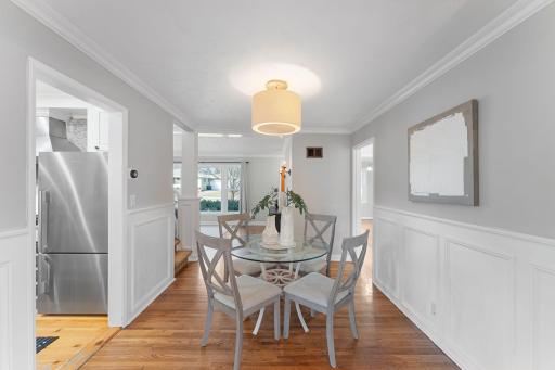 Seamless flow between living, dining, and kitchen spaces.