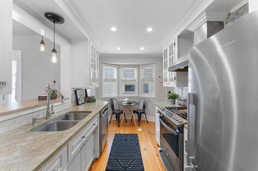 Cozy breakfast/coffee nook sits at the end of the kitchen.