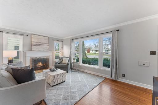 5037 Oxford-Light-filled living room with expansive front windows.