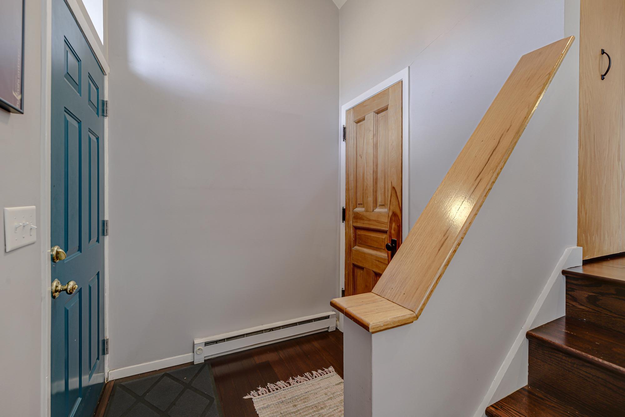 Foyer has a deep closet for shoes and coats