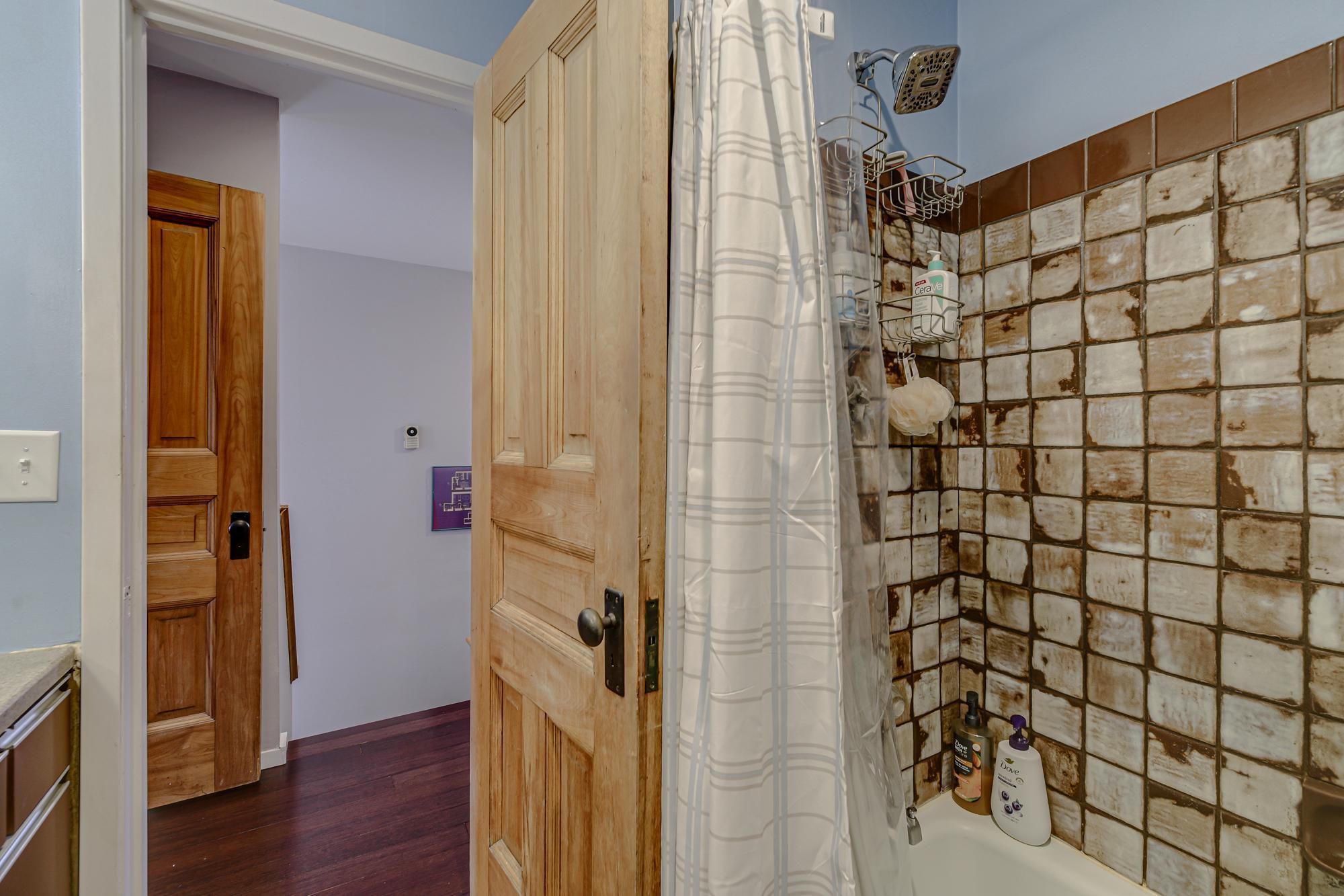 Tiled shower surround and flooring