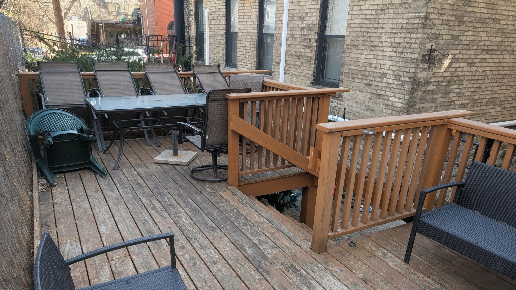 Deck has space for many chairs and a couple tables