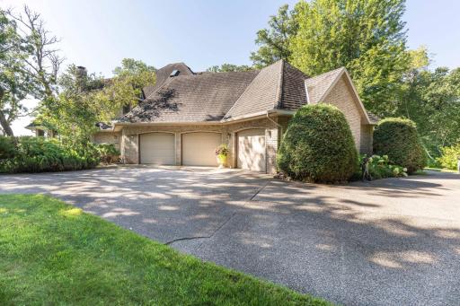 3 car garage with tons of shrubs and perennials.
class 4 roofing (50 year roofing )