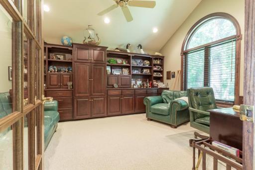 study or den with custom windows and built ins.