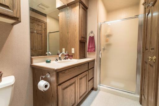 separate shower in this full bath upper level en suite.