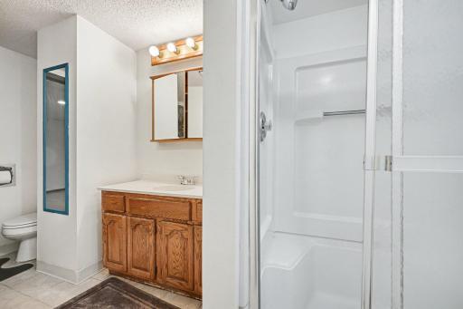 Crisp, updated bath featuring modern fixtures ad a fresh airy feel