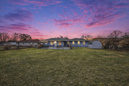 Expansive fenced back yard retreat featuring a patio she and plenty of open space for entertaining gardening or future upgrades.