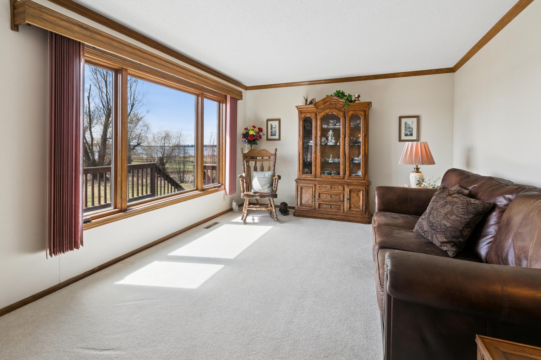 Lots of natural light floods the main living spaces. Great views of the yard and lake to enjoy if you have to be indoors.