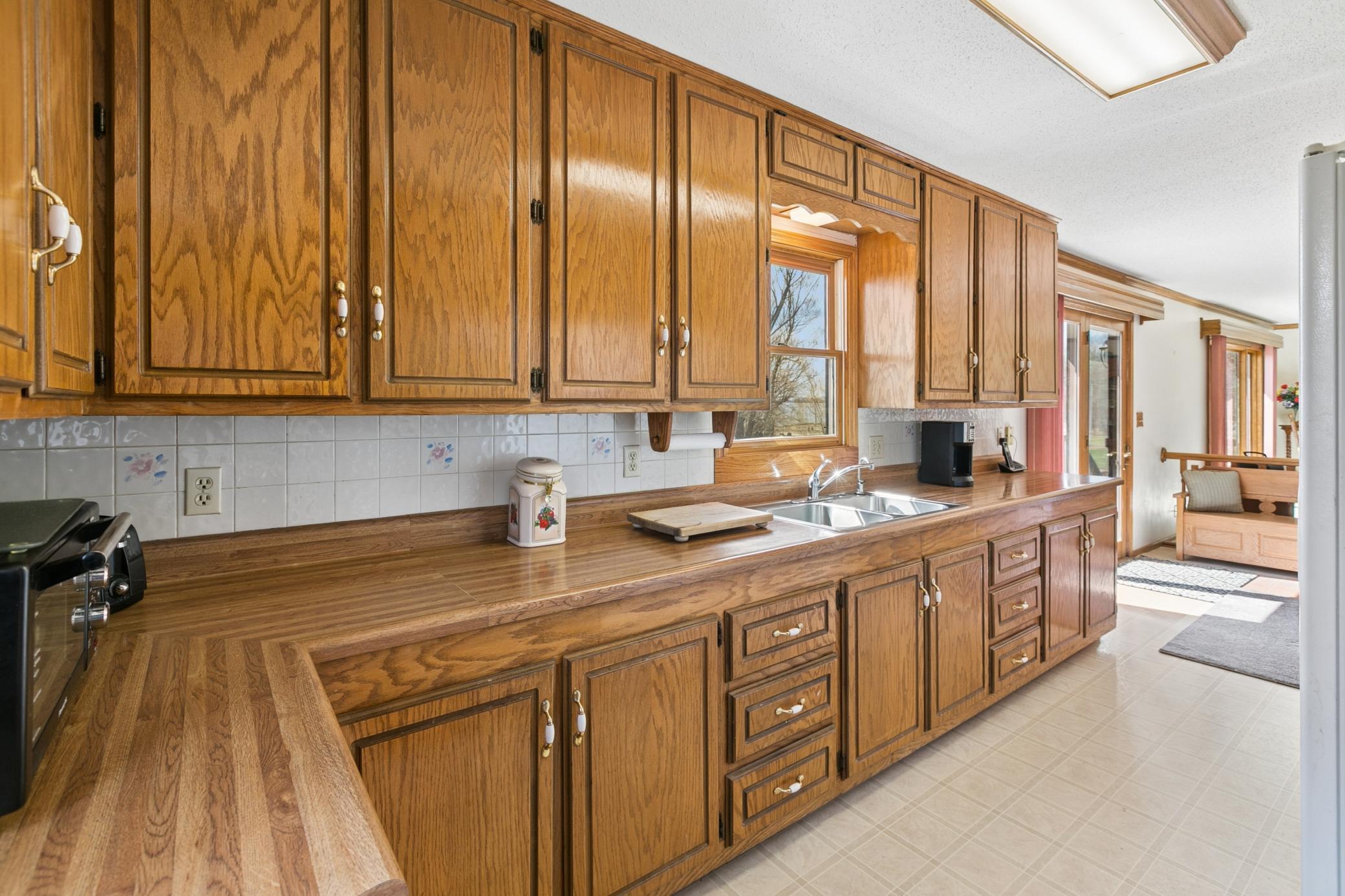 Generous storage in the upper and lower cabinets. Additional "pantry" storage is available.