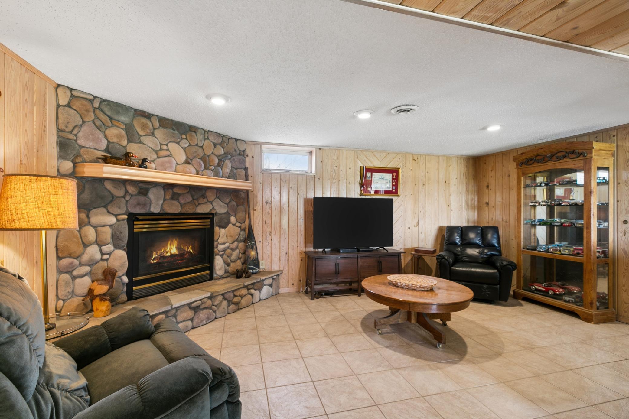 Tile flooring throughout the lower level makes cleanup a breeze, especially when coming in from a day in and on the lake.