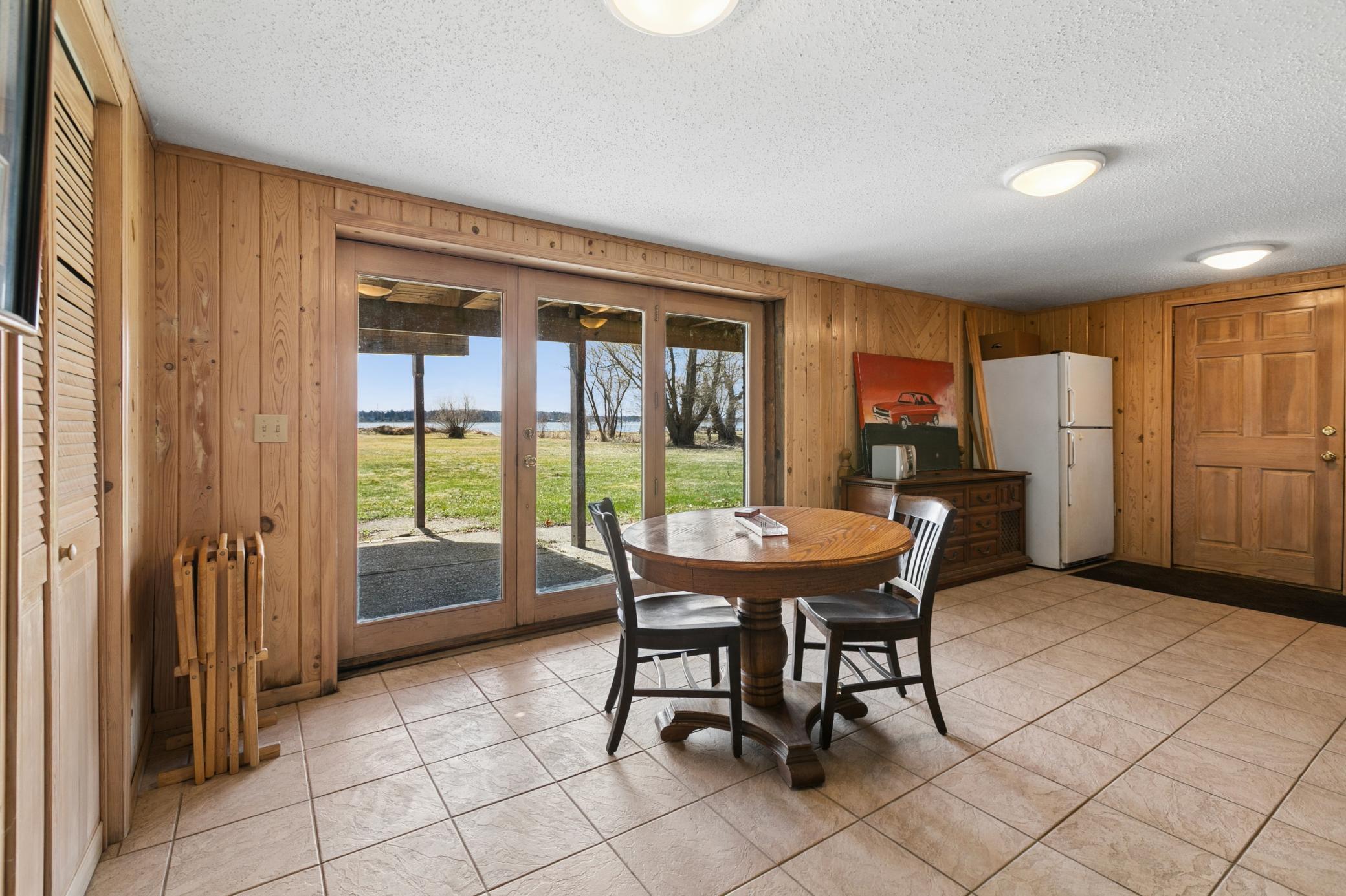 Lots of space for hosting, entertaining or play. (entrance to attached two stall garage.)