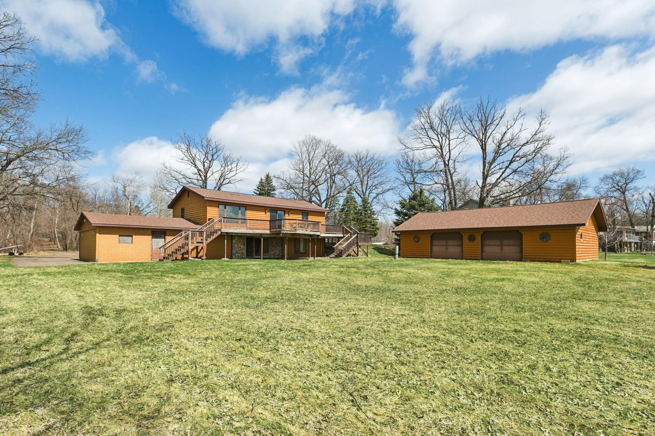 Views of the home and 2nd garage from the lakeshore.