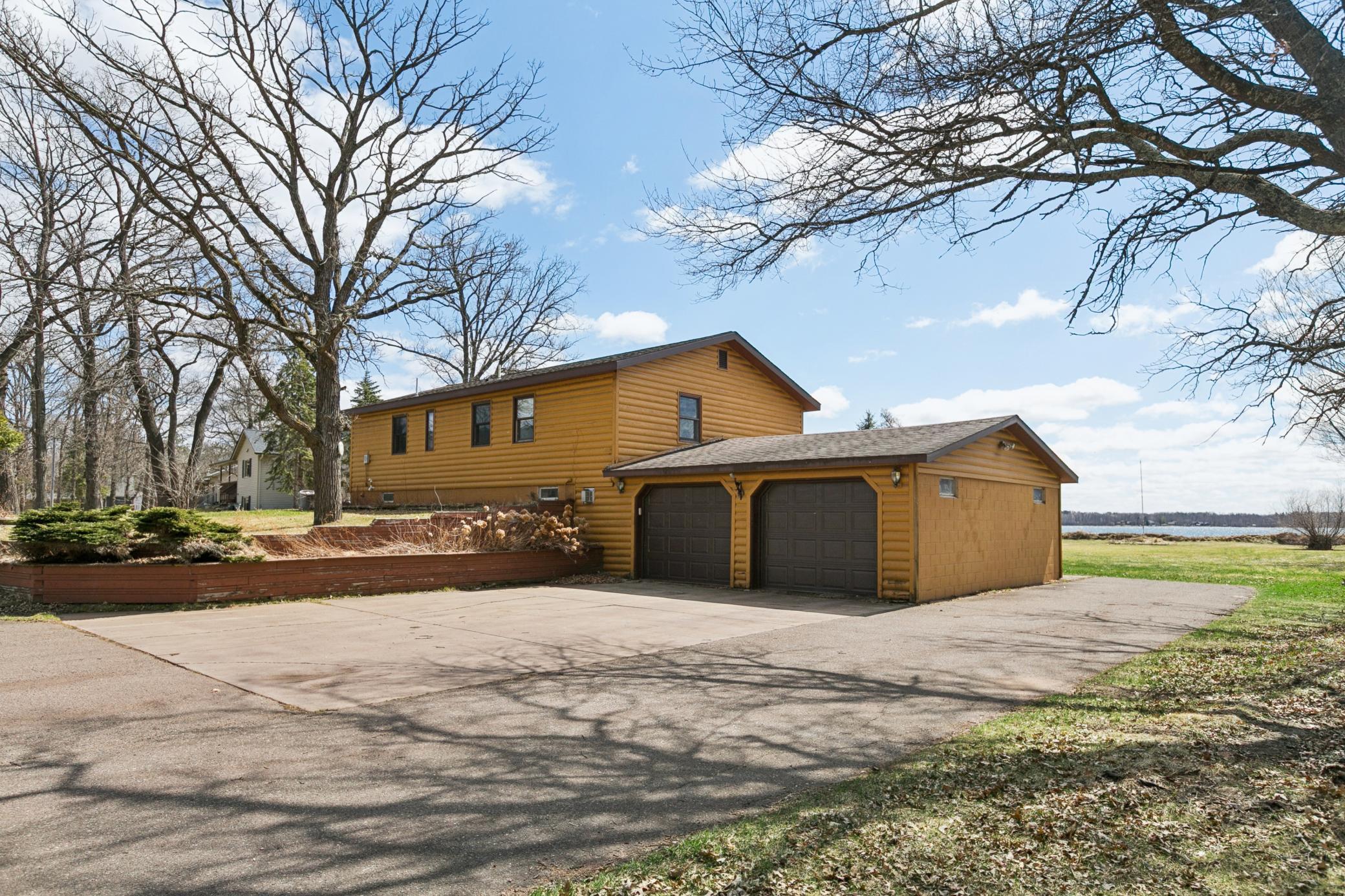 Extra parking along the garage for boats or trailers. Roof replaced about 10 years ago.