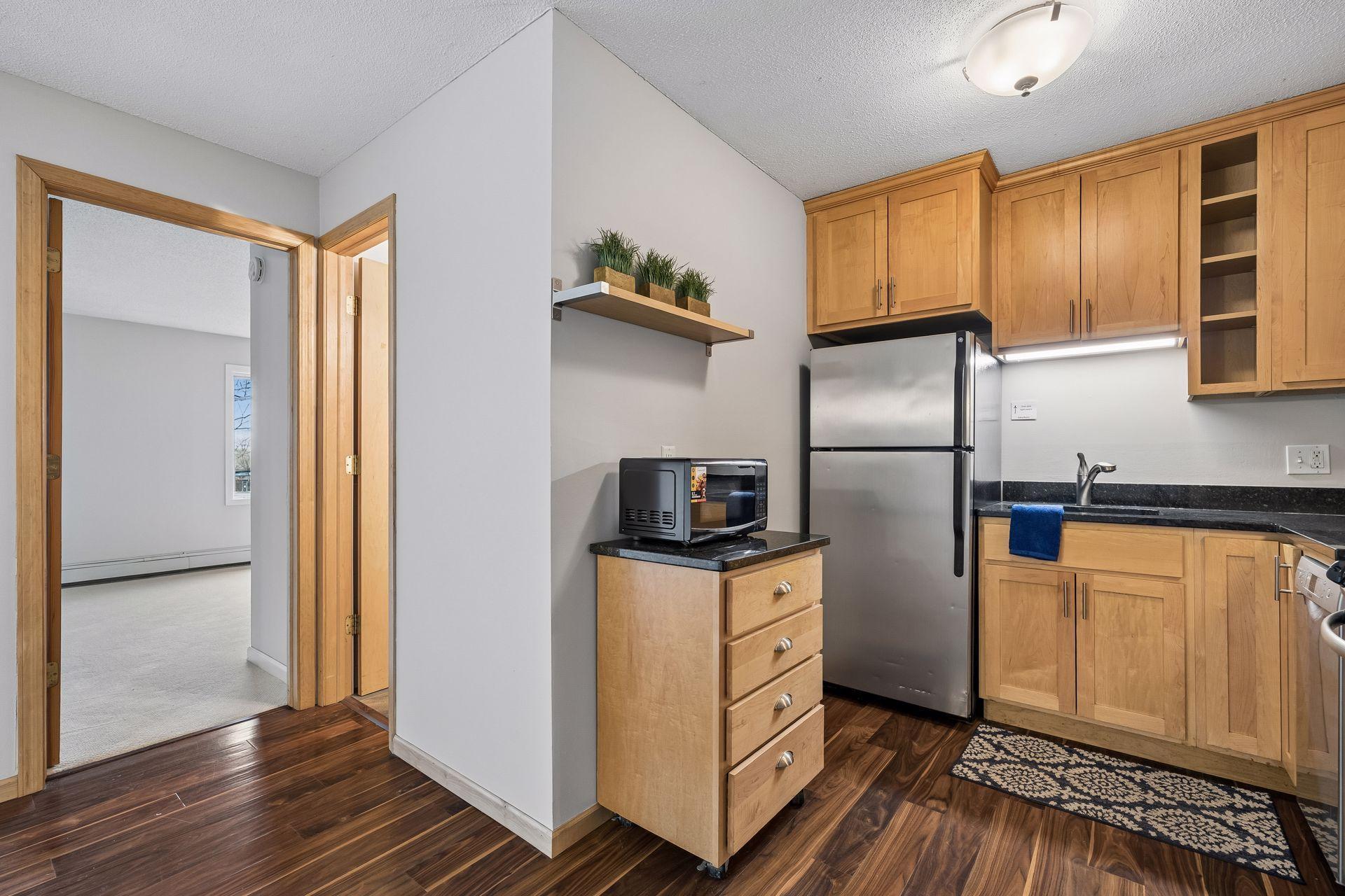 New microwave and cart stay with the home