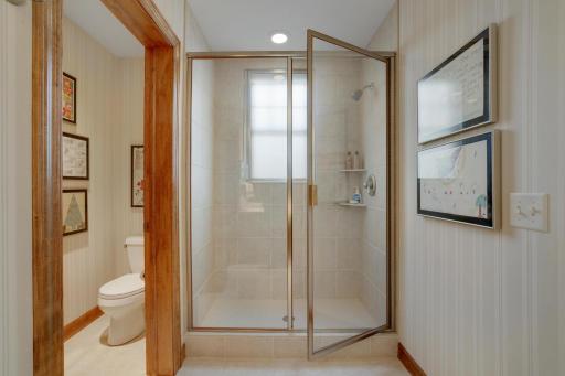 Separate shower and private commode. Double vanities.