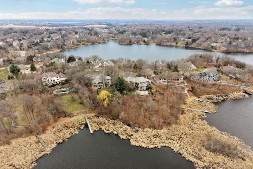 Overlooking Red Rock Lake this exceptional house is waiting for your dock and lake enjoyment.