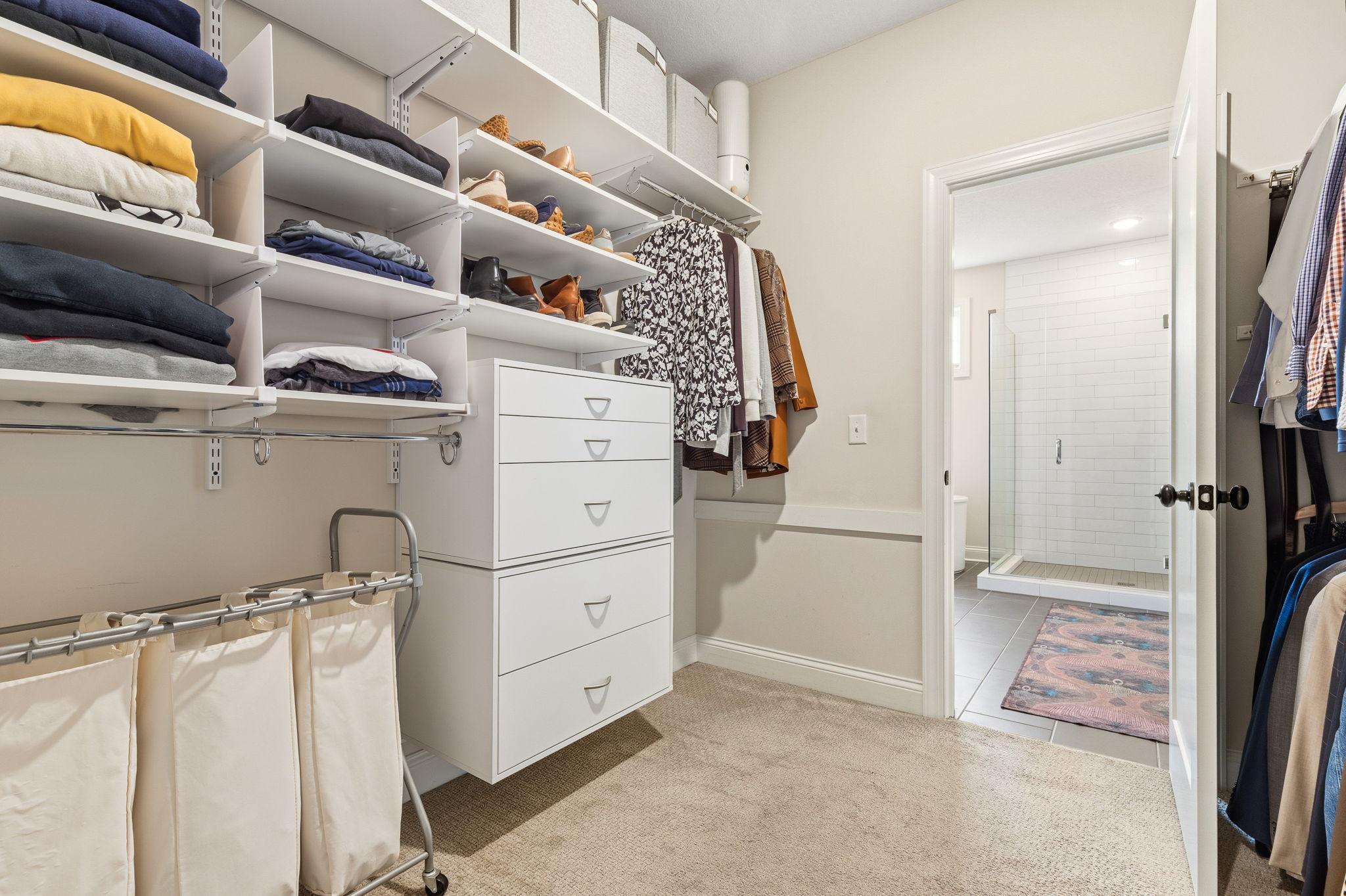 Owner's walk through closet from ensuite to laundry room