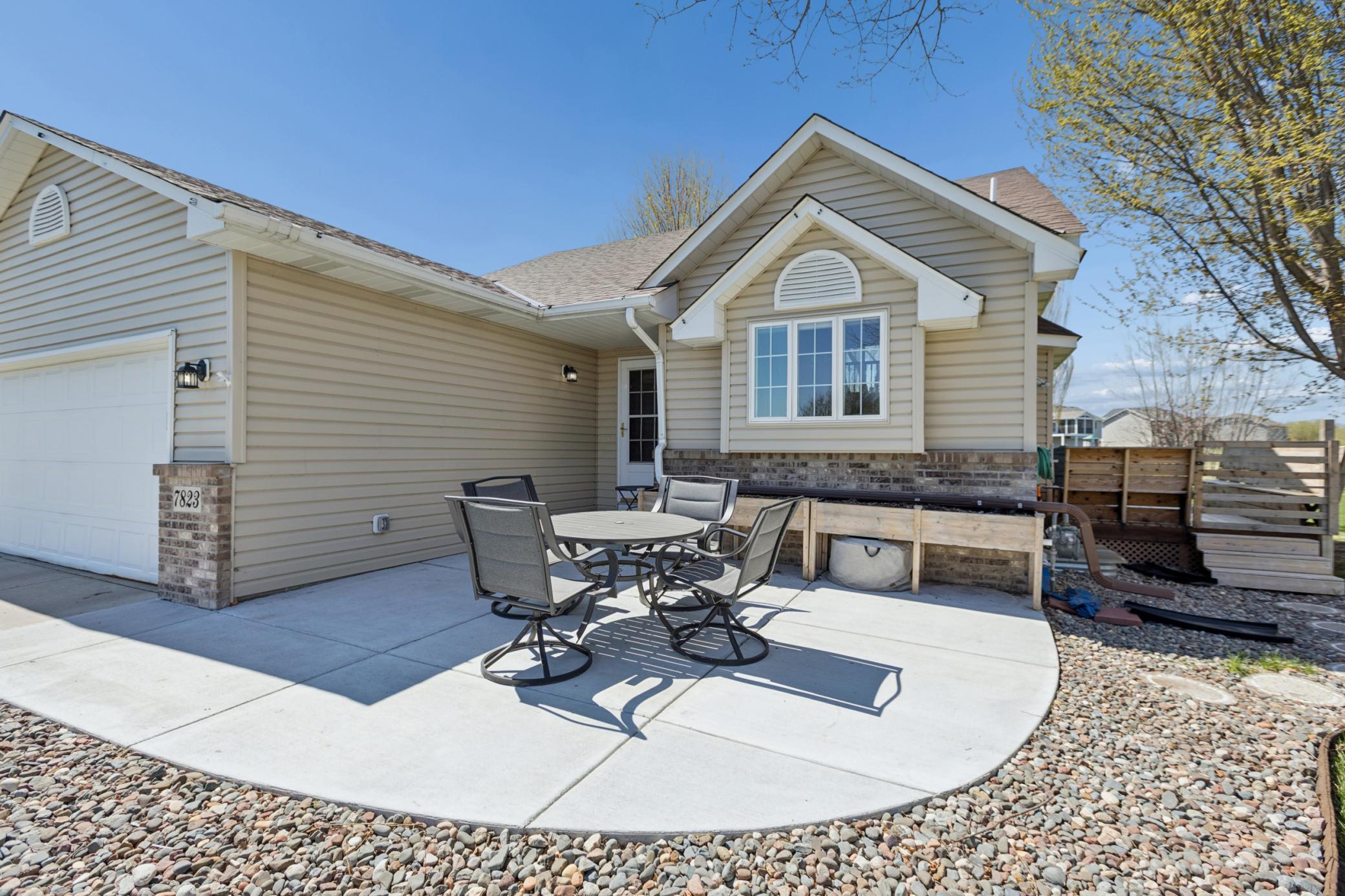 The patio is the perfect place to relax, chat with friends and neighbors or watch the kids playing.