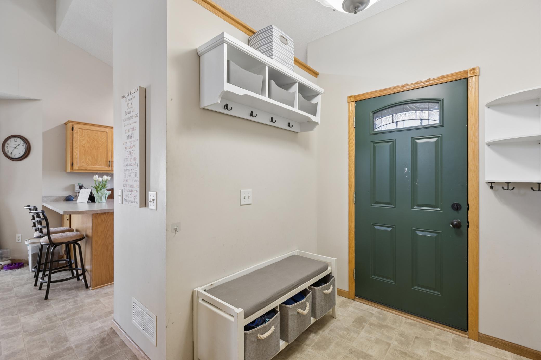 Plenty of space to get ready to head out in the spacious Foyer. Great floor plan opens right up to the dining and kitchen.