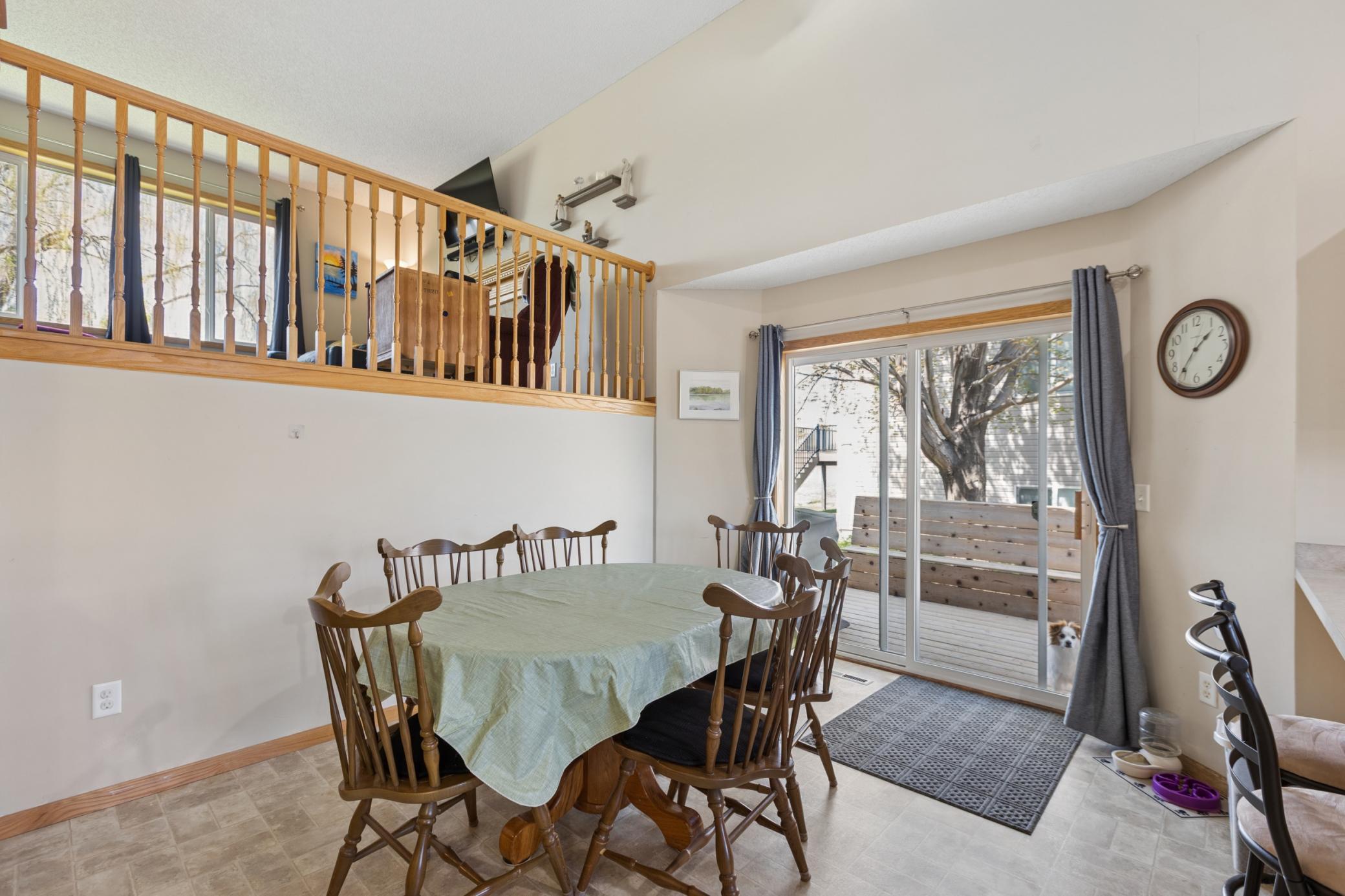 The dining room walks out to the deck. The perfect spot for the grill. Lots of natural light and the perfect access to the backyard.