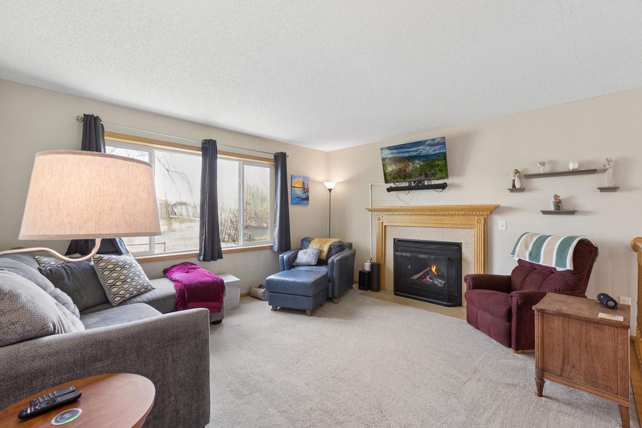 Family room is the perfect place to gather to watch a movie or relax by the fire on a chilly Spring day! Call for your private showing today!
