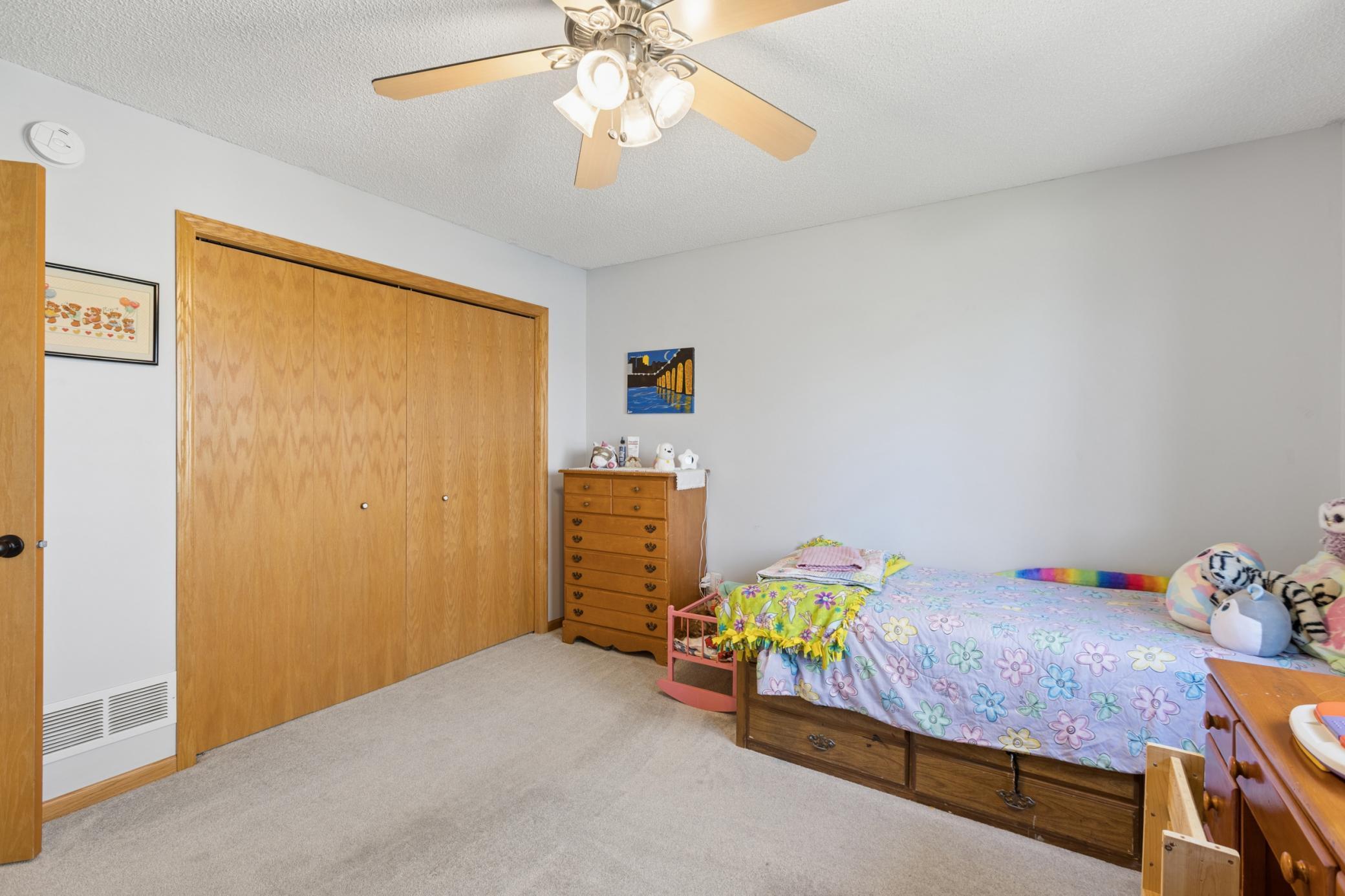 Another view of the nice sized room and closet. Plenty of space to keep organized.
