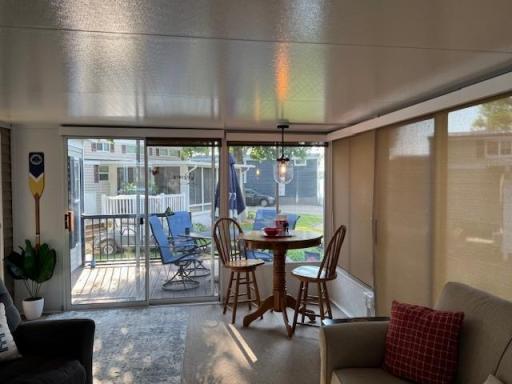 Huge 20' x 12' lake side Screen and window Family room complete with shades for sleep over guests.