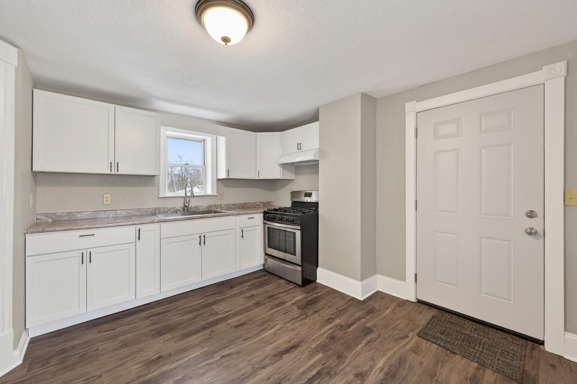 Kitchen has new appliances, nice natural lighting, fresh paint.